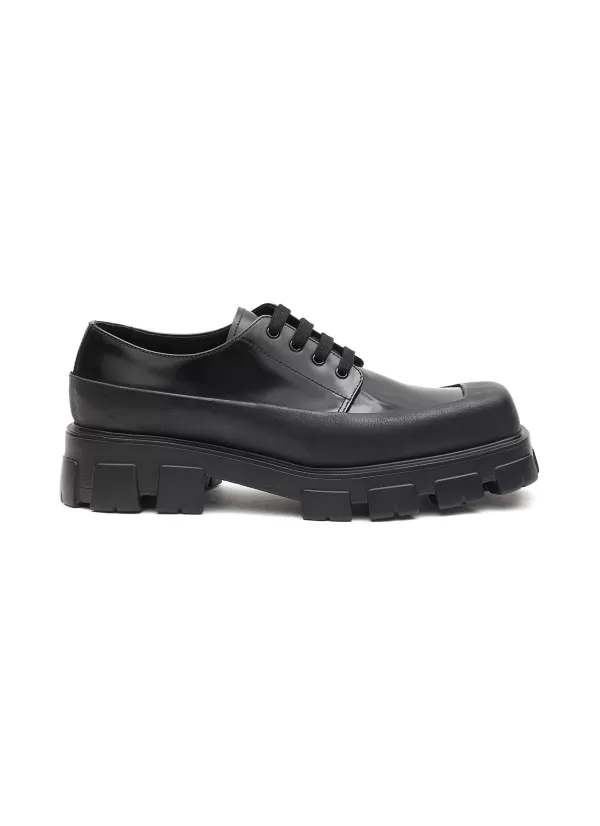 Flats>PRADA Monolith' Logo Applique Spazzalato Leather Penny Loafers